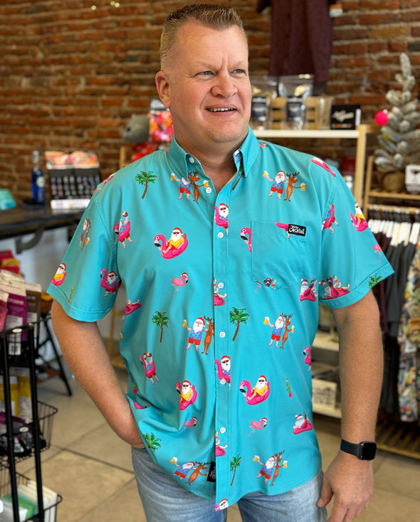 Man wearing a colorful shirt with cartoon characters in a store setting
